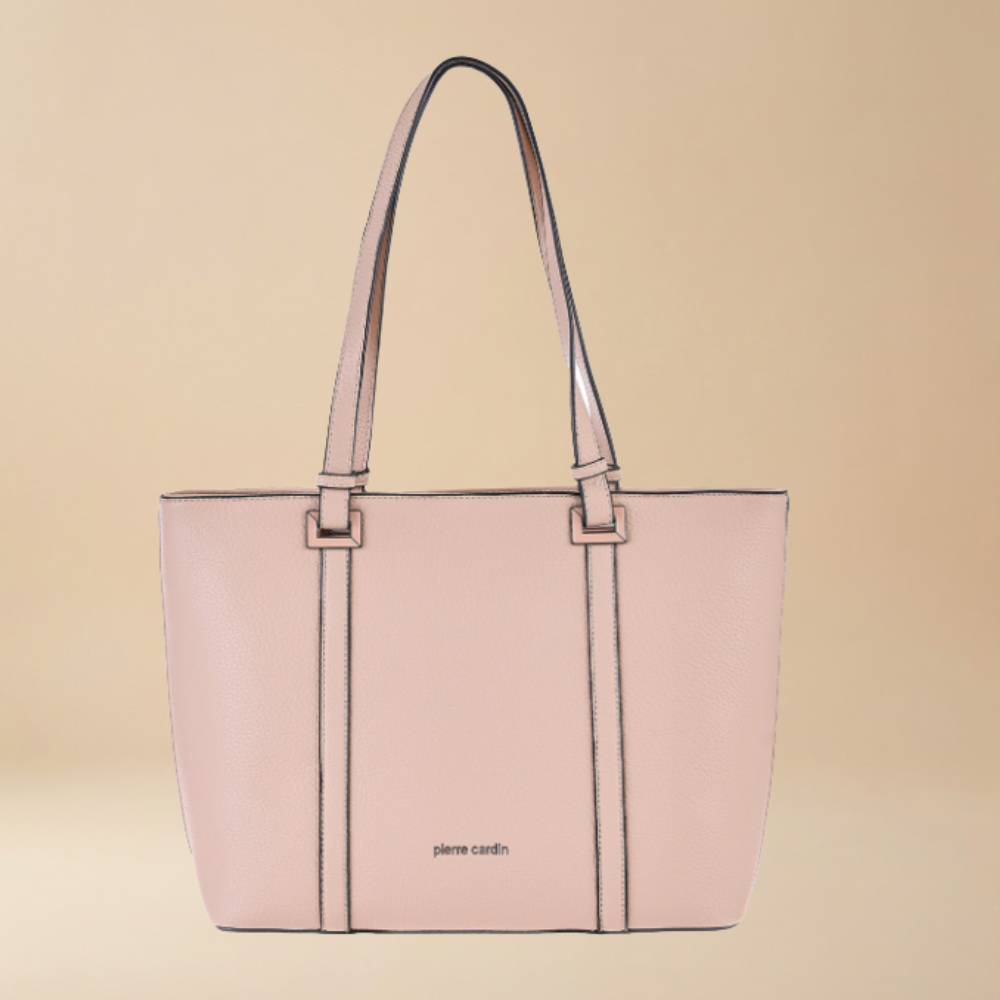 Pink handbag  totebag with a visible brand name on a beige background